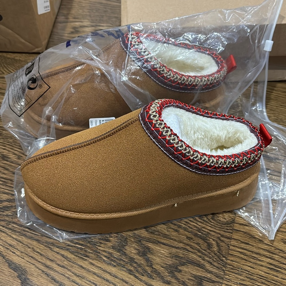 Brand new Chestnut colored platform fur lined clogs